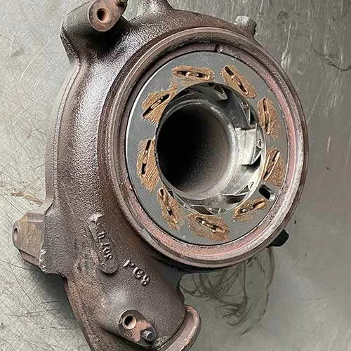 Take apart the turbine housing and clean it.